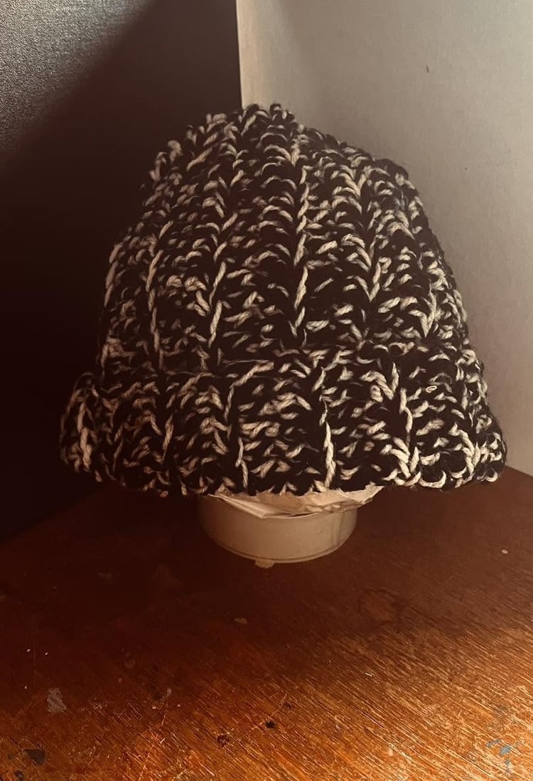 Handmade black and white crochet woolly hat, cosy two-tone winter beanie with an 8 x 9 inch folded measurement.