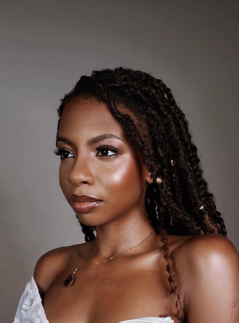 Melanie Renee, Barbadian fashion designer of lingerie and clothing brand La Vern by MR. Sewing teacher.