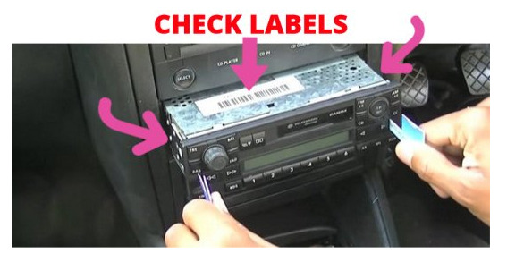 Step 1: First, take out the car radio from the dashboard and search for a label as shown in the picture.