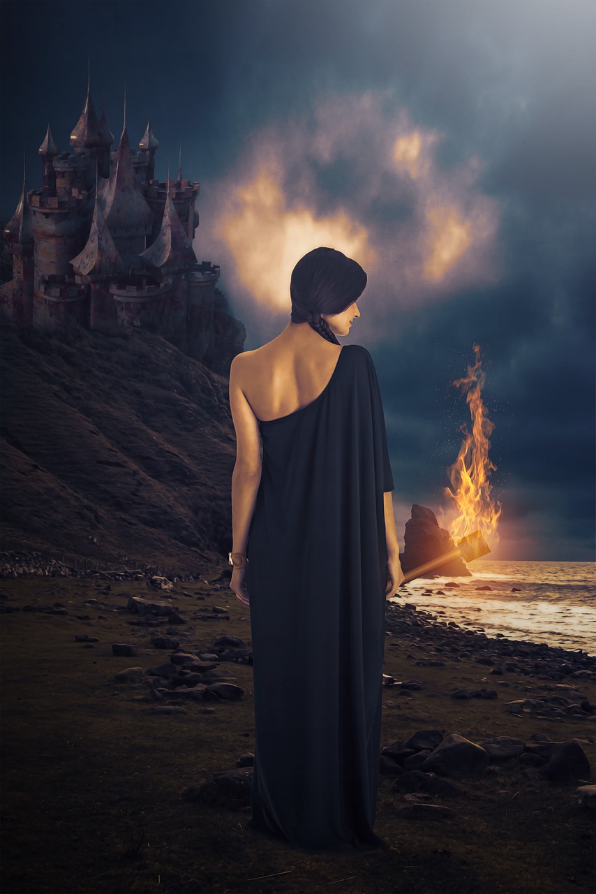 a woman carrying a torch is walking toward a castle on a hill with the surf rolling in at her feet