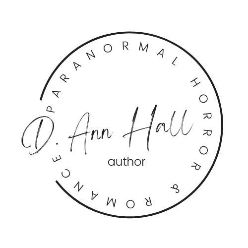 circle logo for author d. ann hall with the phrase paranormal horror & romance