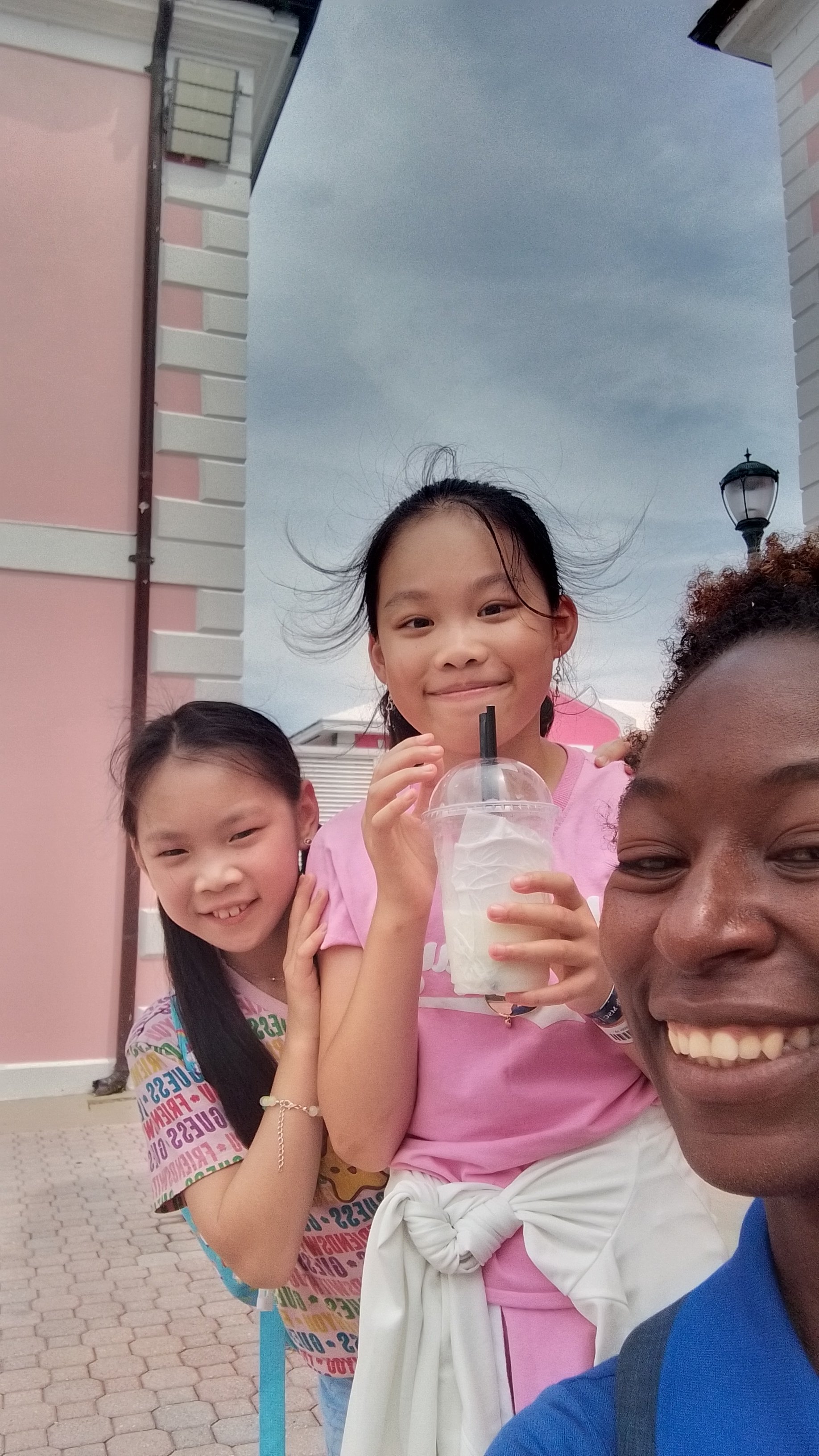 KINDWalk, Nassau tour, Nassau walking tour, walking tour Nassau, free walking tour, walking tour, Bahamas tour, French sisters, colorful sign, GrayCliff Heritage village, Bahama Barrels, things to do in Nassau, free things to do, world famous straw market, Nassau straw market, Bay street, Nassau Bahamas