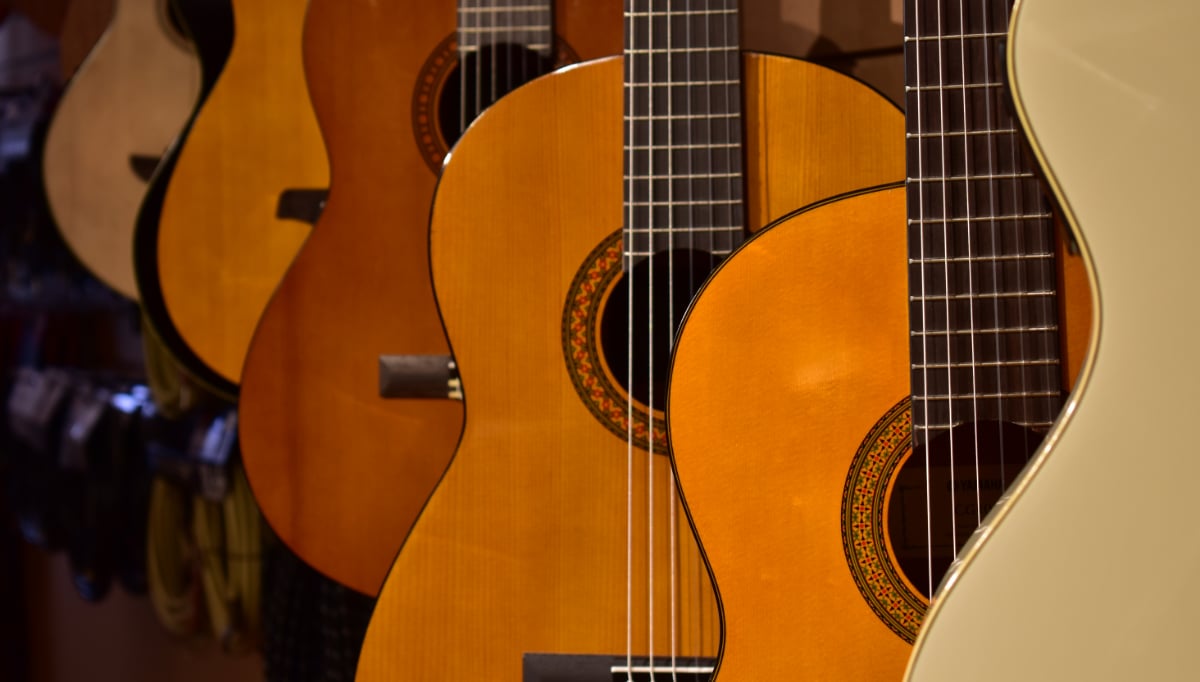 Classical Guitars hanging in a shop.