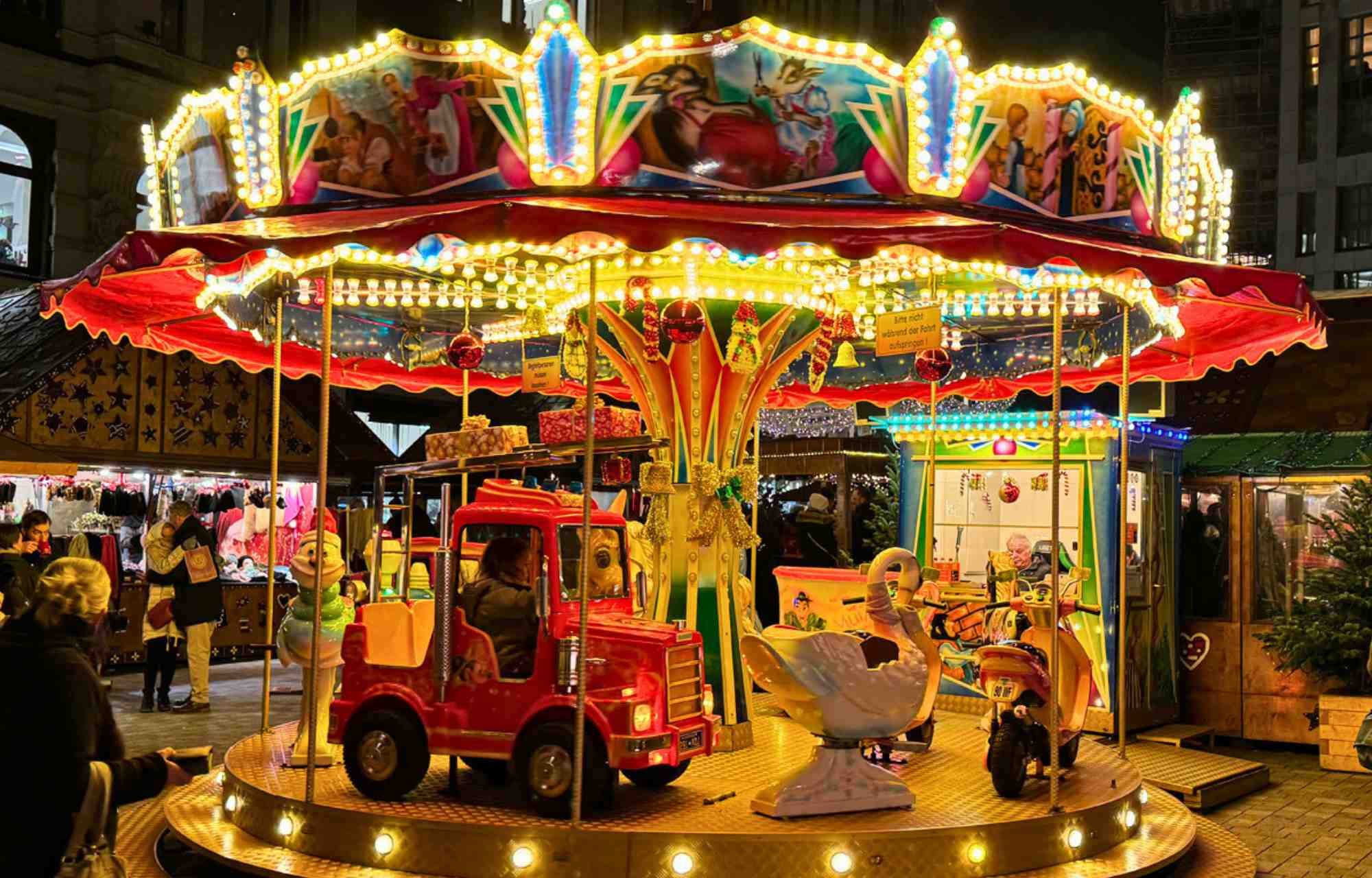 Embark on a journey through the enchanting festivities of the holiday season at Gänsemarkt Christmas Market, proudly acclaimed as Hamburg City's best Christmas market. Immerse yourself in the magical allure of this beautiful Christmas spot in Hamburg, where tradition meets modern charm, creating a Christmas Instagram spot that beckons you to capture and share the joyous moments.  As the crown jewel among Hamburg City's best Christmas markets, Gänsemarkt promises an unparalleled experience, transforming the market square into a picturesque winter wonderland. The air is infused with the spirit of the season, making it a lovely Xmas market that resonates with the warmth of festive traditions. Families, friends, and visitors alike find themselves drawn to this beautiful Christmas spot in Hamburg, seeking a respite from the ordinary and embracing the extraordinary.  Gänsemarkt Christmas Market is not merely a market; it is a carefully curated and lovely Xmas market that caters to the desires of those seeking a memorable holiday experience. The stalls, adorned with festive decorations and twinkling lights, create a mesmerizing ambiance that elevates Gänsemarkt to the status of Hamburg City's best Christmas market. Every detail is meticulously designed to ensure visitors are transported into a world of seasonal magic.  In the age of social media, Gänsemarkt proudly stands as a Christmas Instagram spot in Hamburg, inviting visitors to capture and share the beauty of the season. The picturesque setting, with its charming stalls and festive backdrop, provides an ideal canvas for creating lasting memories and sharing the joy of the holidays with the world.  What sets Gänsemarkt apart is its ability to blend tradition with a contemporary touch, making it a beautiful Christmas spot in Hamburg that caters to the diverse preferences of its visitors. From classic holiday treats to modern twists on festive favorites, the market offers a culinary journey that complements the overall enchanting experience.