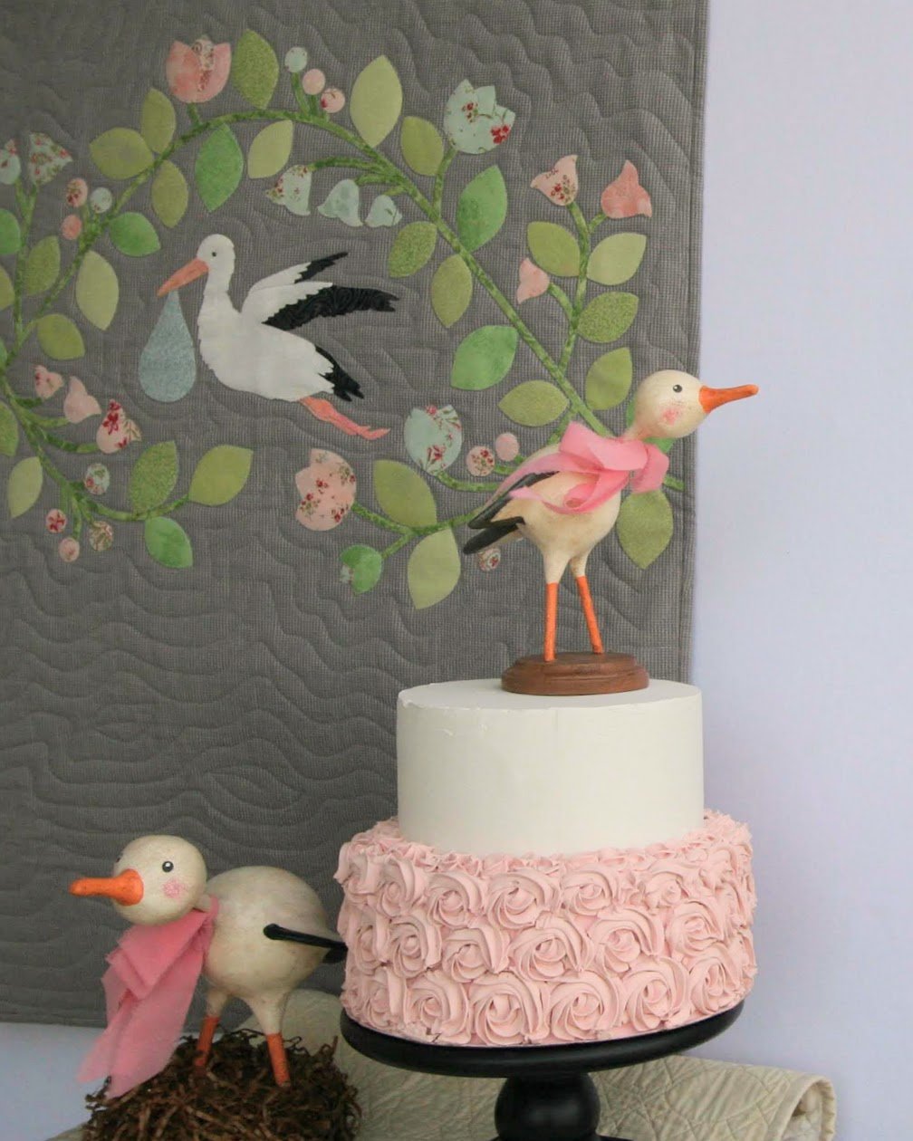 paper mache stork made by Wiggle Creek Designs to celebrate baby shower