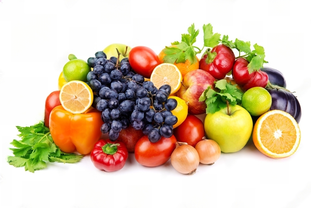 a bunch of fresh fruits on a white background
