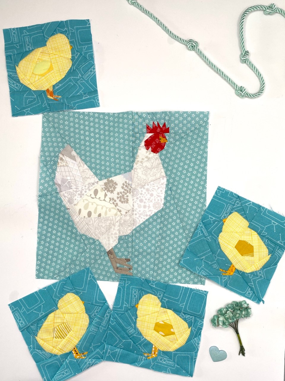 A cute Chicken Quilt block, and several smaller baby chicken quilt blocks that were eventually made into a mini quilt. The quilt blocks are heavily reliant on using low volume fabrics that were scraps from my fabric stash.