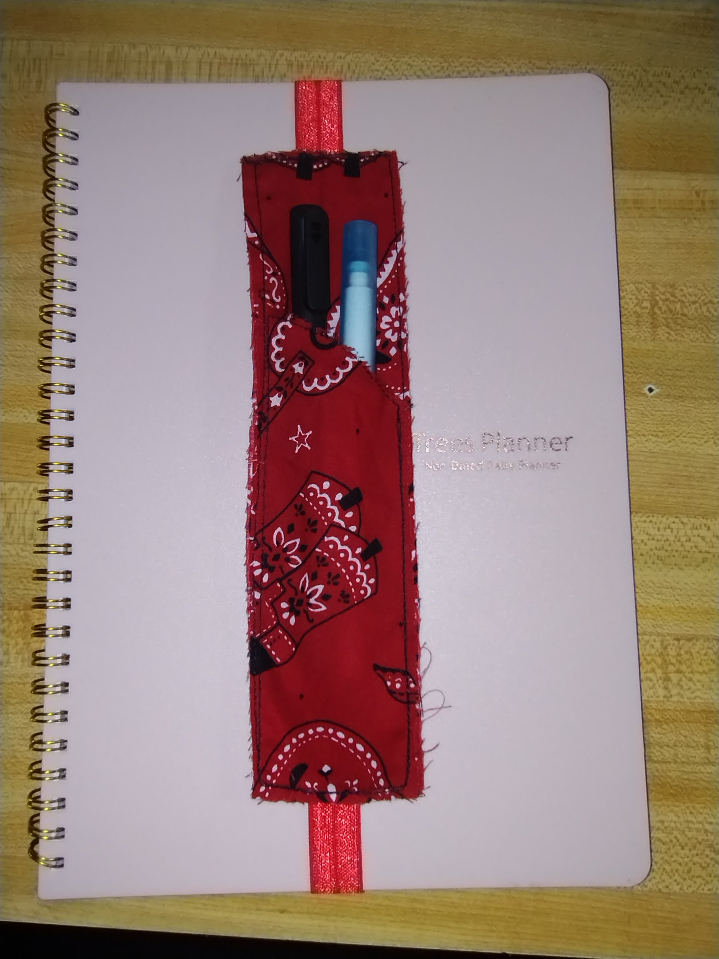 Adjustable bookmark with pen holder. - Payhip