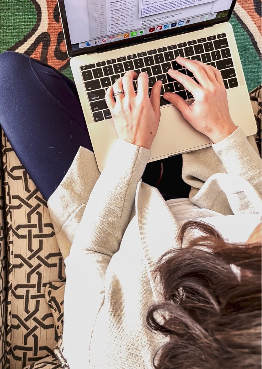 Woman on laptop | The Musicpreneur Model for self-employed musicians and music freelancers by Ashley Danyew & Steve Danyew