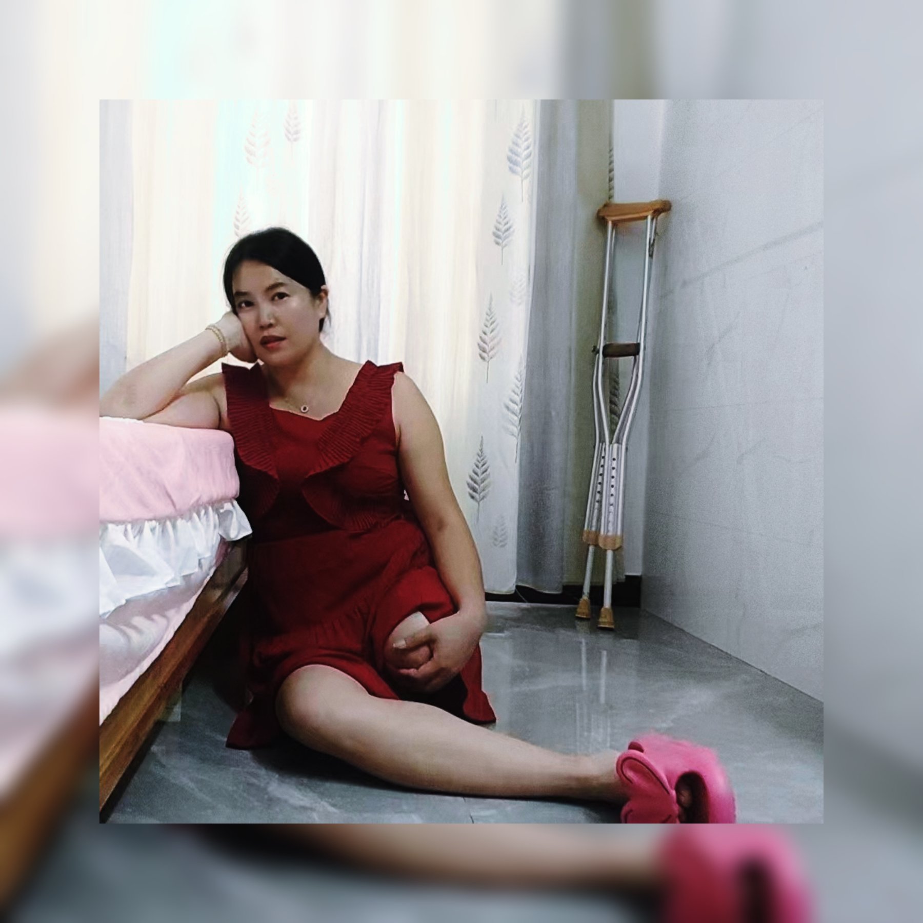 dalila-sak-amputee-girl-changes-into-a-red-dress-and-black-stockings