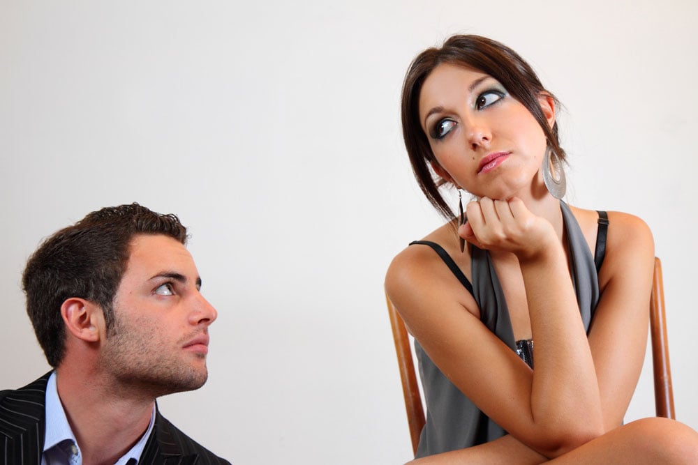 guy looking up to a woman