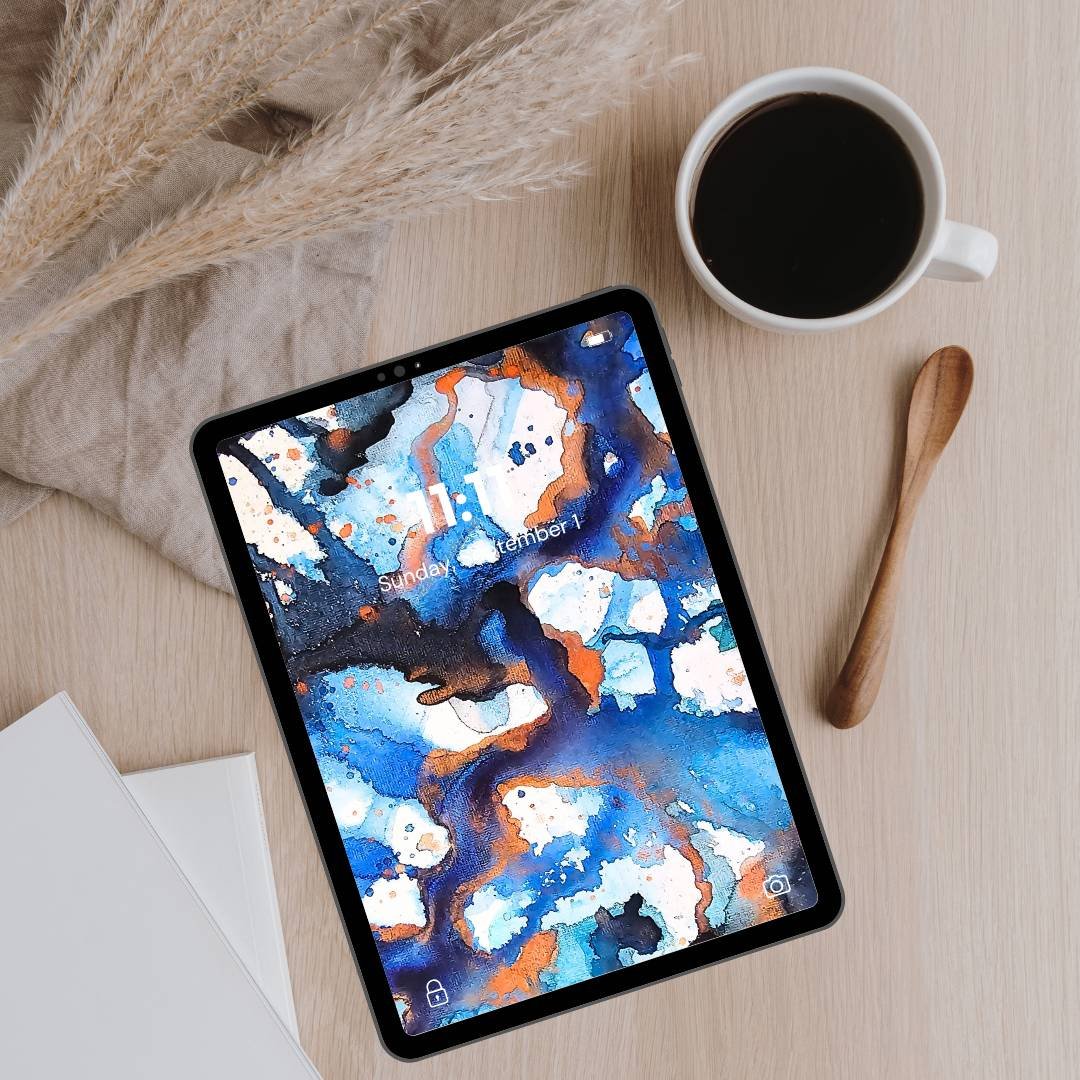 Abstract tablet wallpaper in bold blues, cobalt, and bronze tones, inspired by nebulae and cosmic exploration.