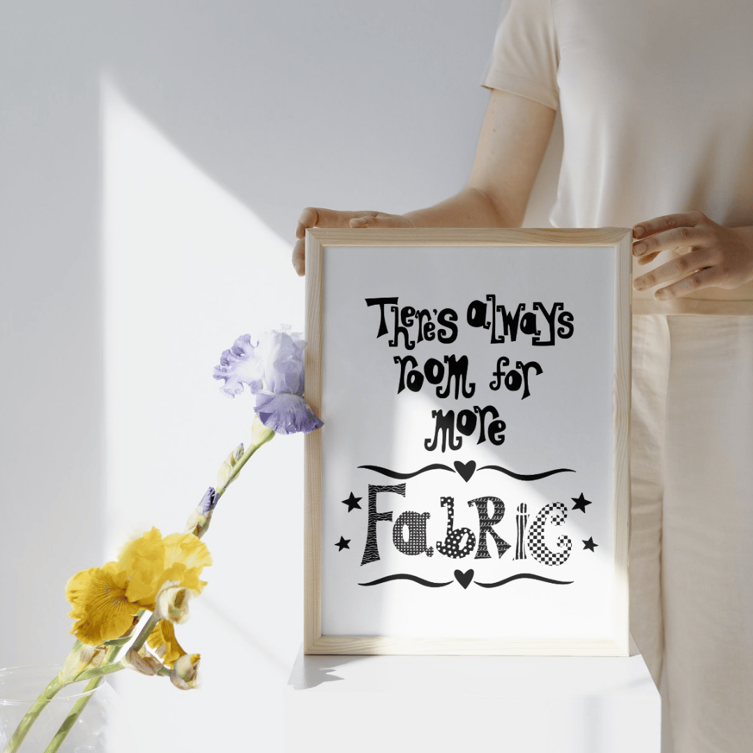 A downloadable print with a hand lettered design which says ‘there’s always room for more fabric’ in black.