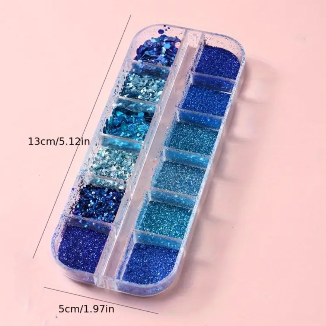 Applying sparkly blue glitter from 12 Grids Sparkly Blue Nail Glitter Set using a nail art tool.