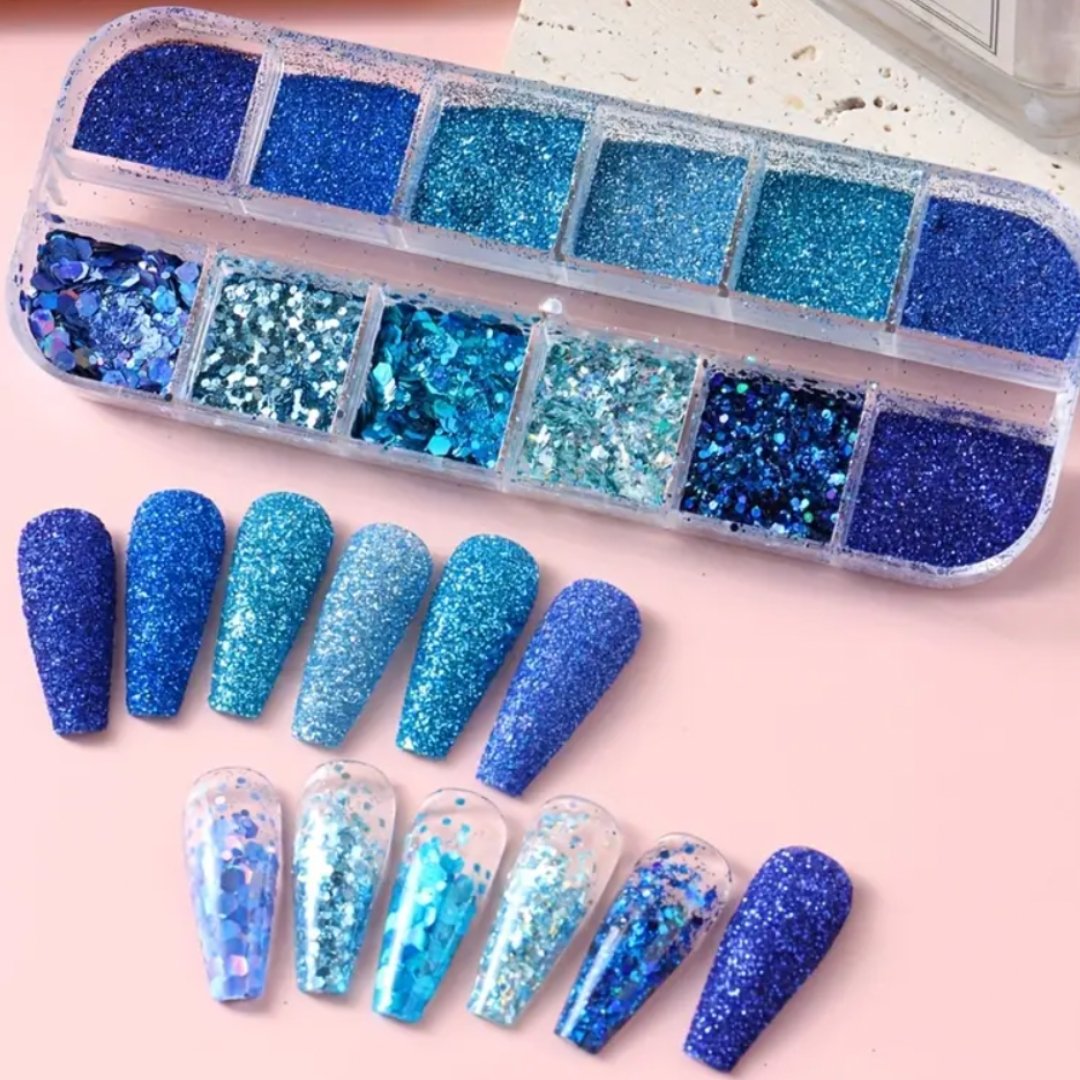Nail art design featuring the 12 Grids Sparkly Blue Nail Glitter Set applied on a manicure.