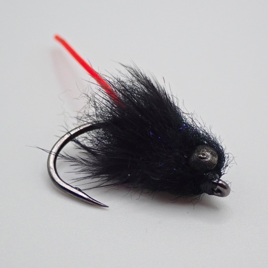 Single Carp Vader Dark Hybrid fly with red tail, designed and tied by Matt Campbell, The Fly Guy.