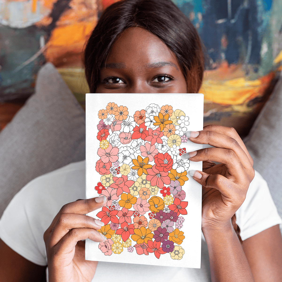 woman holding up a page of the 365 flower field tracker