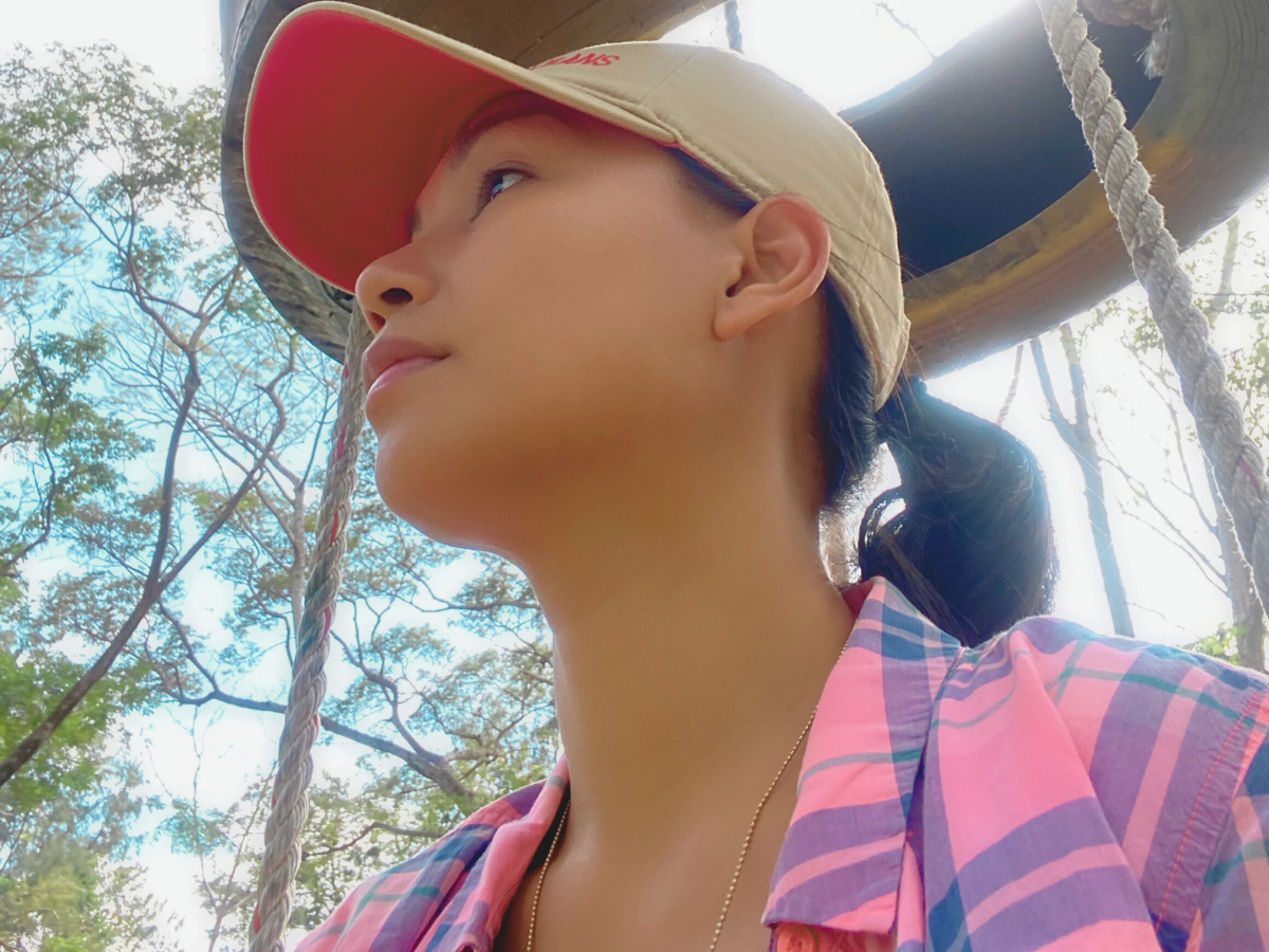 An overwhelmed mom staring at the horizon lost in the endless demands of motherhood, searching for tools for mental health support for first-time moms