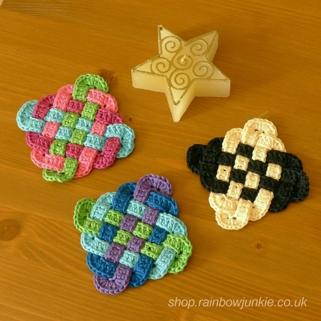 Four part Celtic plaitwork coaster in blu, green, pink and dark red