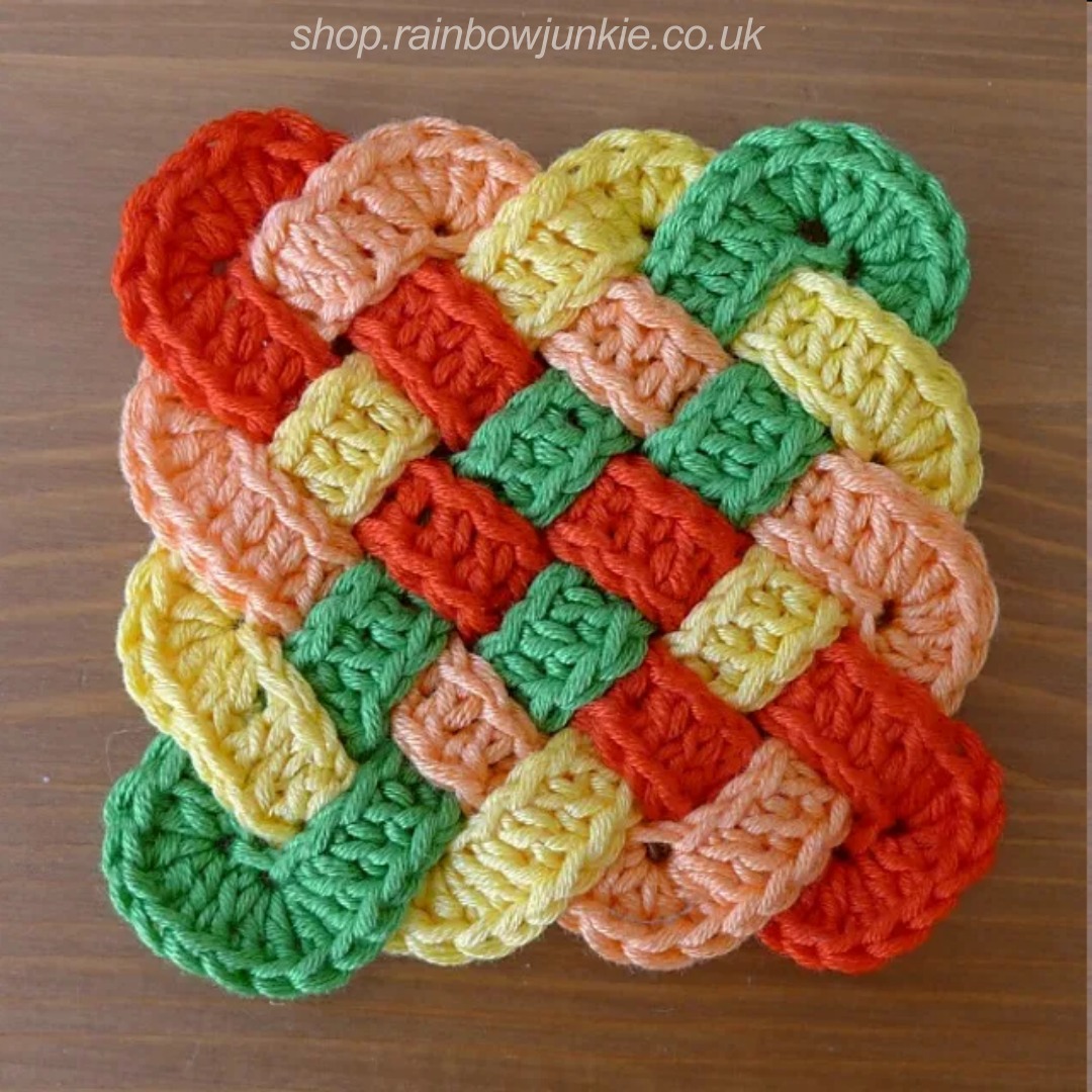 Four part Celtic plaitwork coaster in red, orange, yellow and green.