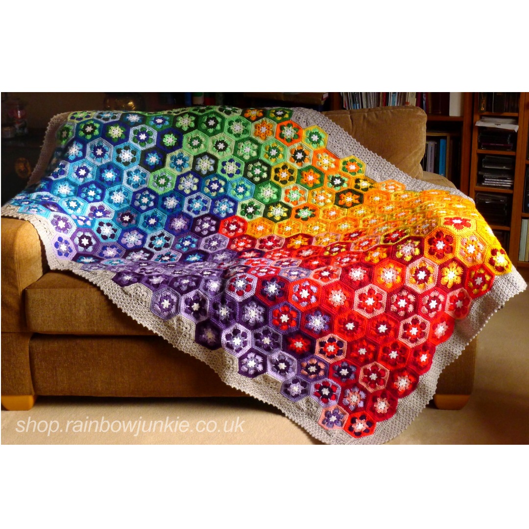African Snow Flower Blanket draped over a settee.