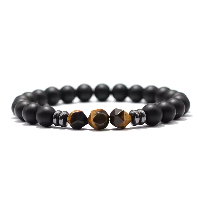 Matte black onyx and golden-brown Tiger Eye bead bracelet featuring three central faceted Tiger Eye stones accented by metallic hematite spacers.