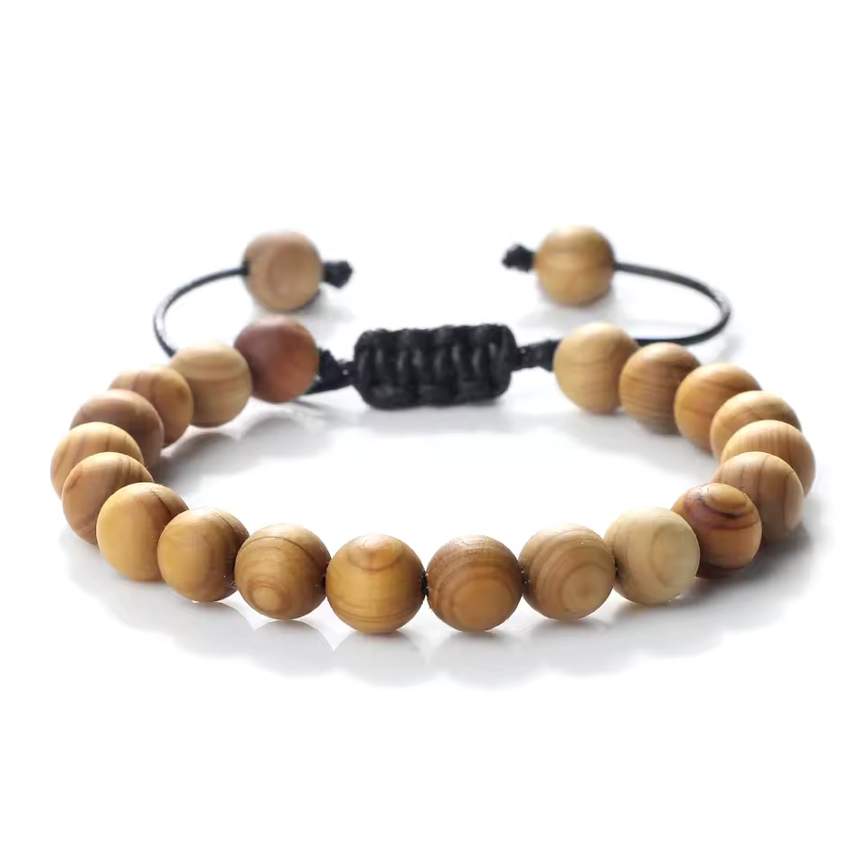Handmade light natural Cliff Cypress wood bead bracelet, featuring round beads (available in sizes like 6mm, 8mm, or 10mm) with visible grain, and a black adjustable macrame Shamballa knot closure. Unisex yoga jewelry (inspired by bracelet perle bois hom