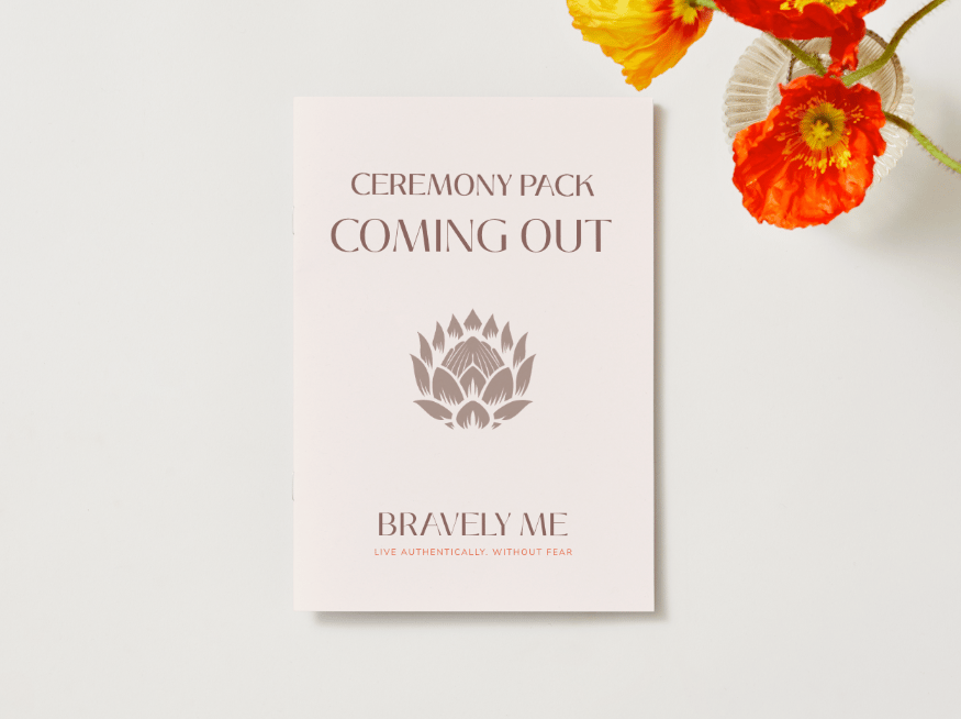 Bravely Me Coming Out Ceremony Pack shown on a light background with orange flowers, celebrating LGBTQ+ identity with pride and care.