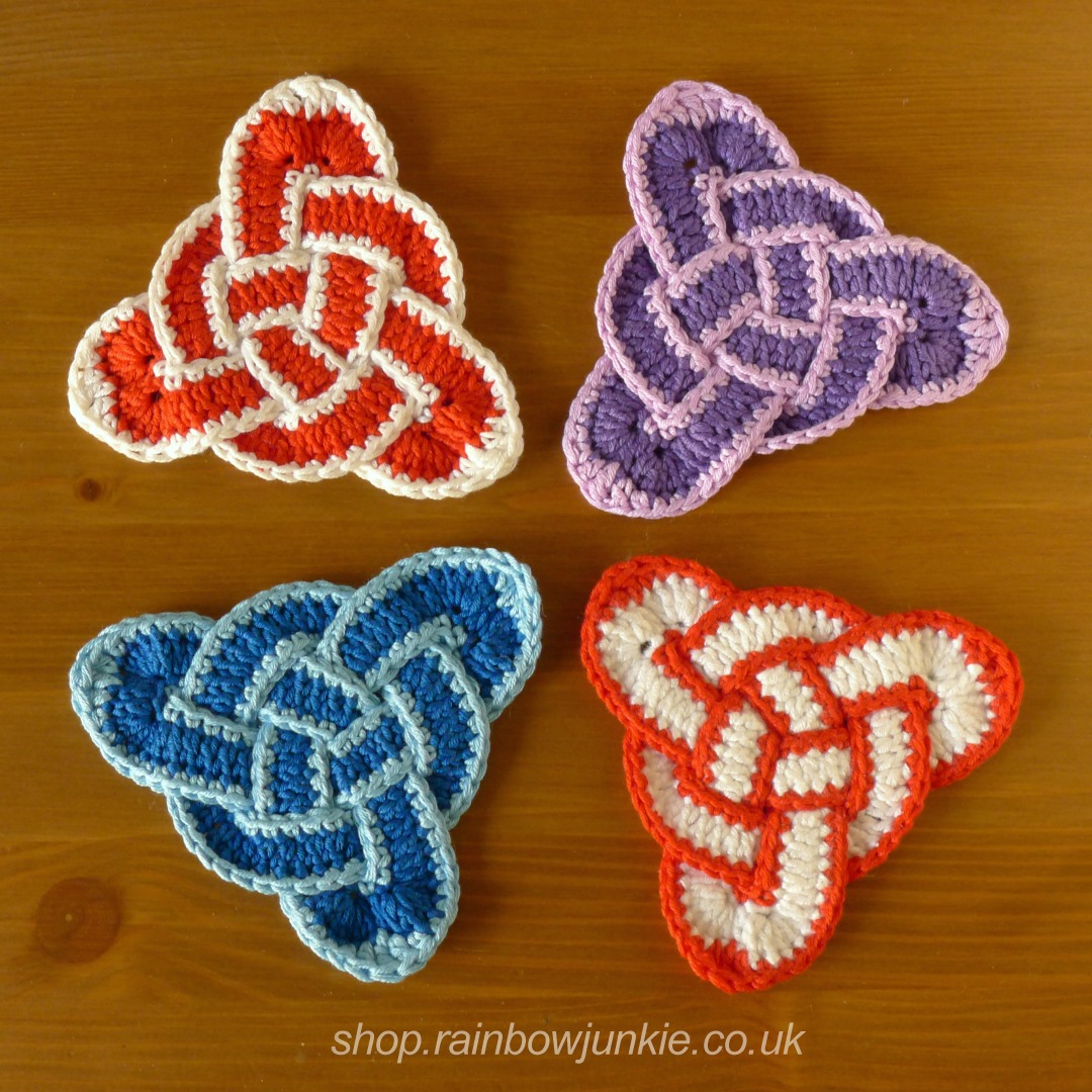 Four different triquetra coasters showing different colour choices.