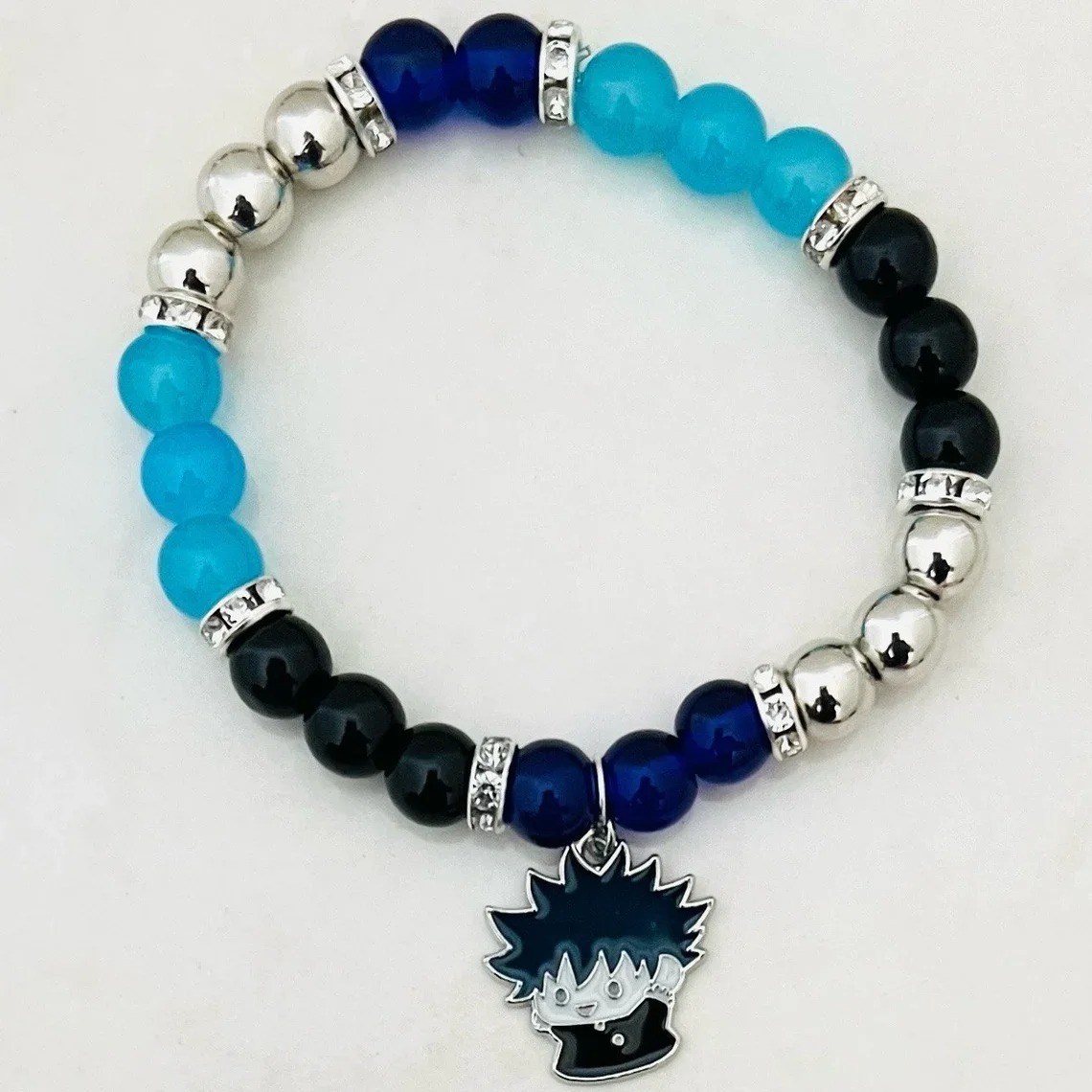 Handcrafted Megumi Fushiguro bracelet featuring dark blue and black tones – Y2K decorative style with anime-inspired minimalist elegance.