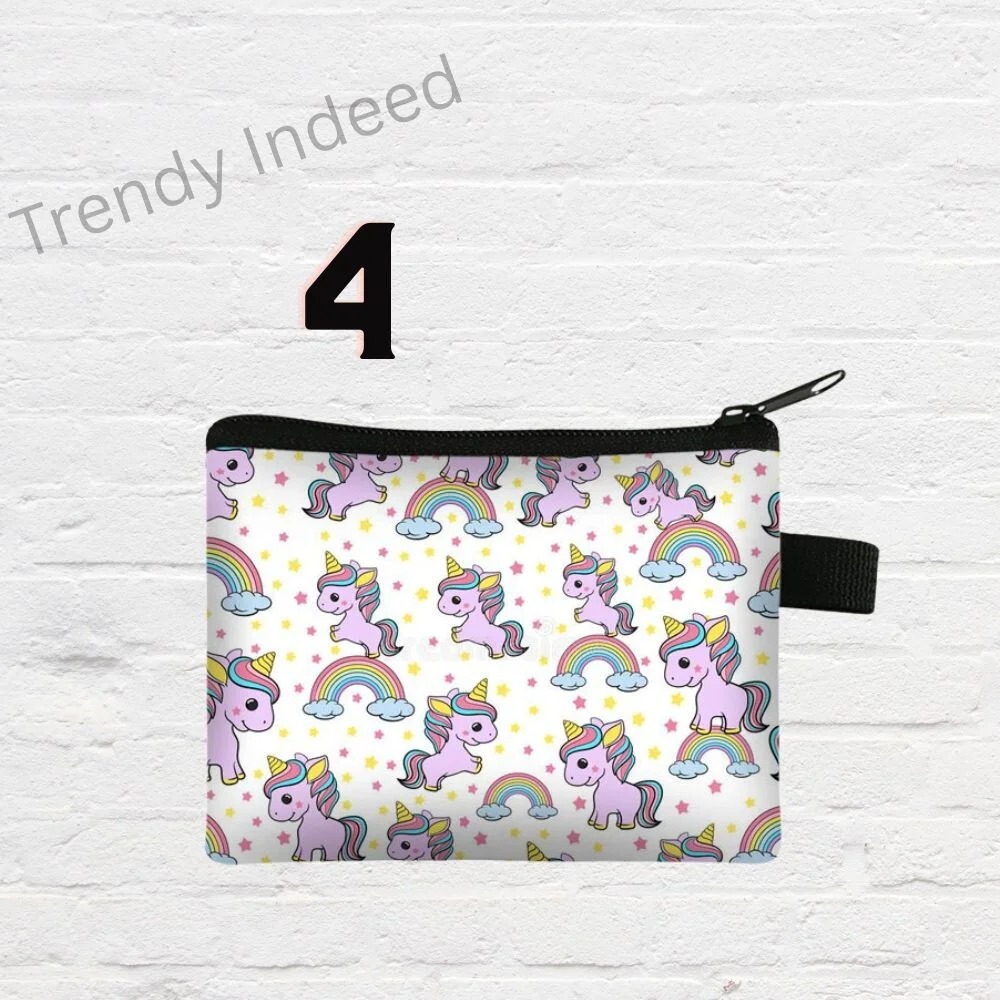 Kids’ wallet and coin purse with whimsical unicorn artwork and rainbow accents.