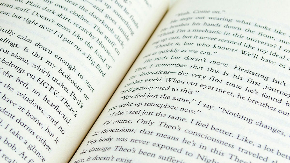 Open book showing printed text, representing the Expressions reading list from The Creative Guide, with titles that strengthen creativity, emotional intelligence, and lateral thinking.