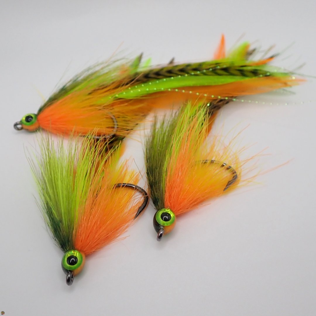 Three Deceiver streamer flies in firetiger colors, tied by Matt Campbell, The Fly Guy.