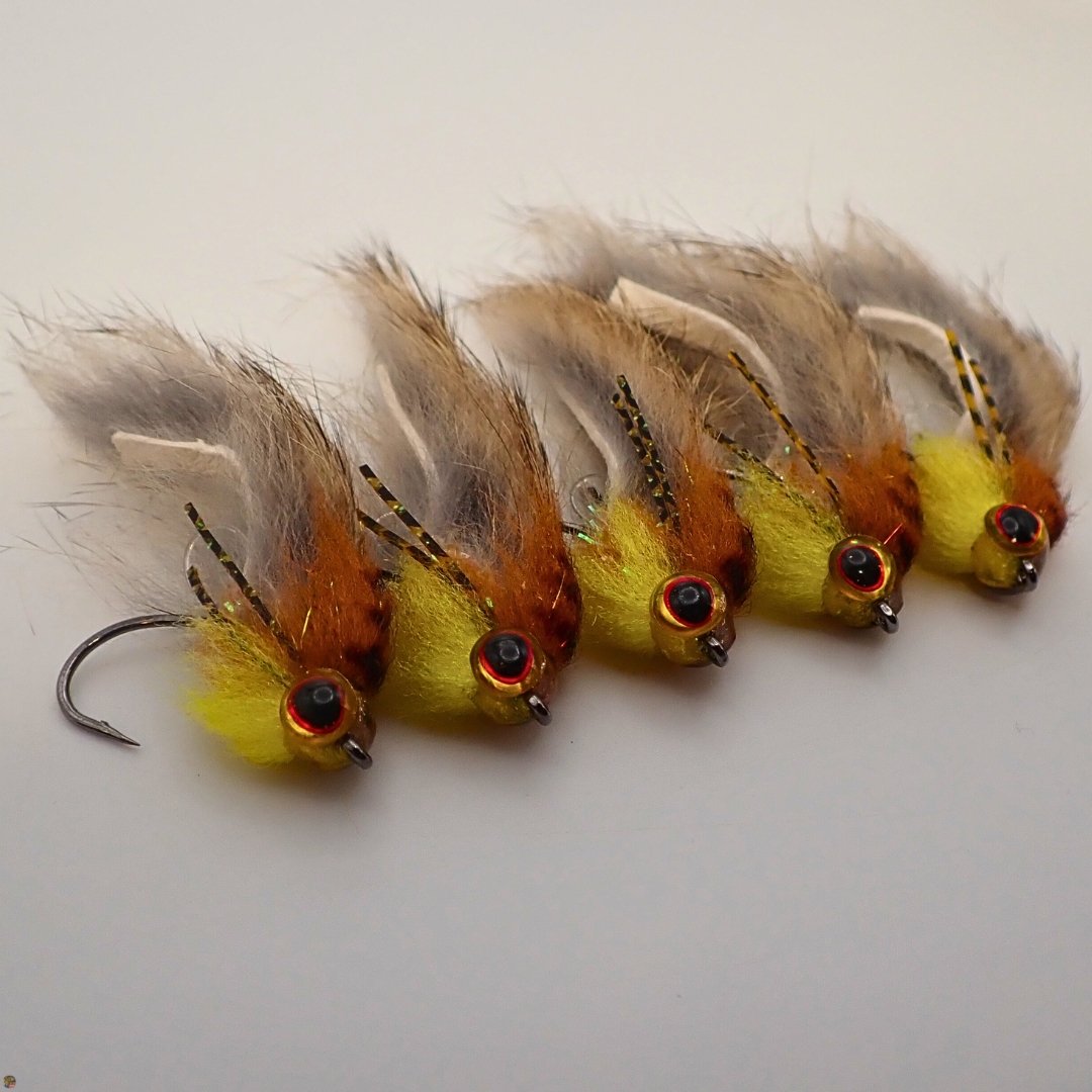 Five honey brown Bass Zonker smallmouth bass streamer flies, custom-tied by The Fly Guy, Matt Campbell.