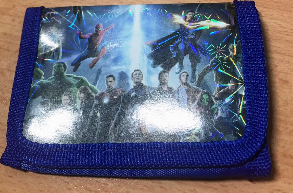 Compact children’s wallet with hero team design, trifold style.