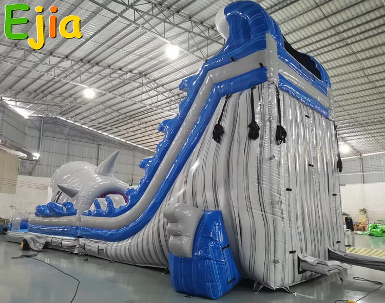 Make a splash with the Ejia Inflatables Commercial Shark Water Slide! This heavy-duty, commercial-grade blow-up water slide features a thrilling shark design, perfect for parties & events. Durable, safe, and fun for kids. Shop at EjiaInflatables.com.