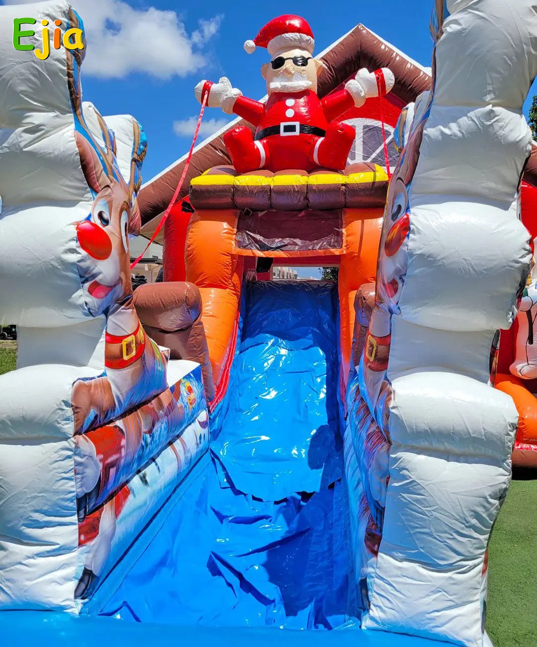 kids-playing-santa-bounce-house-christmas-party-fun