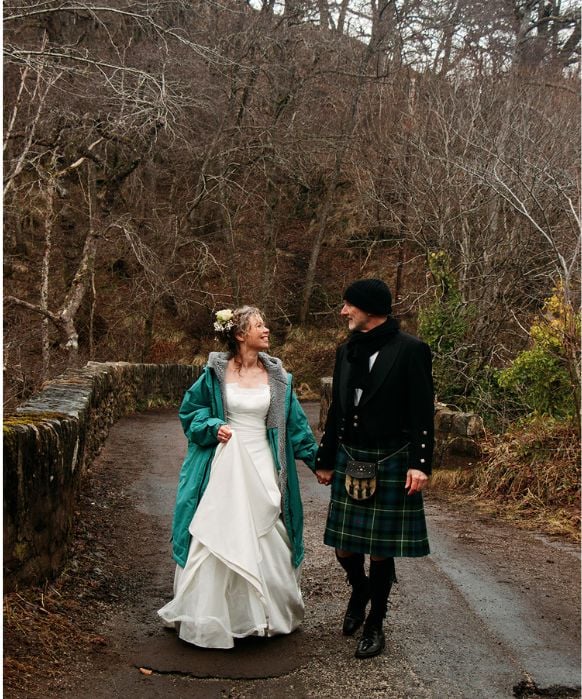 Author Cat Darling—Walking hand in hand with Mr Darling on our Highland elopement