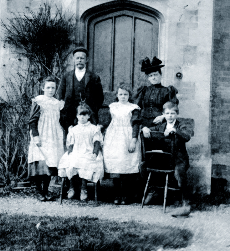 Walter Parker & his family outside the engineer's cottage, The Tank Yard, 1896.