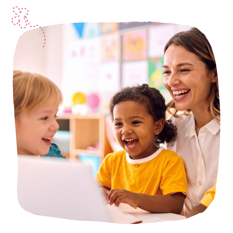 Adult and two children happily learning