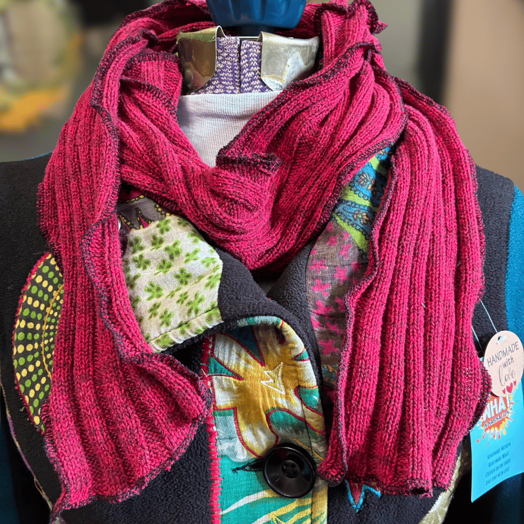 Upcycled scrappy scarf in deep crimson with metallic accents and black stitching, handmade from rescued sweaters with wavy ribbed texture by What in Narnation.