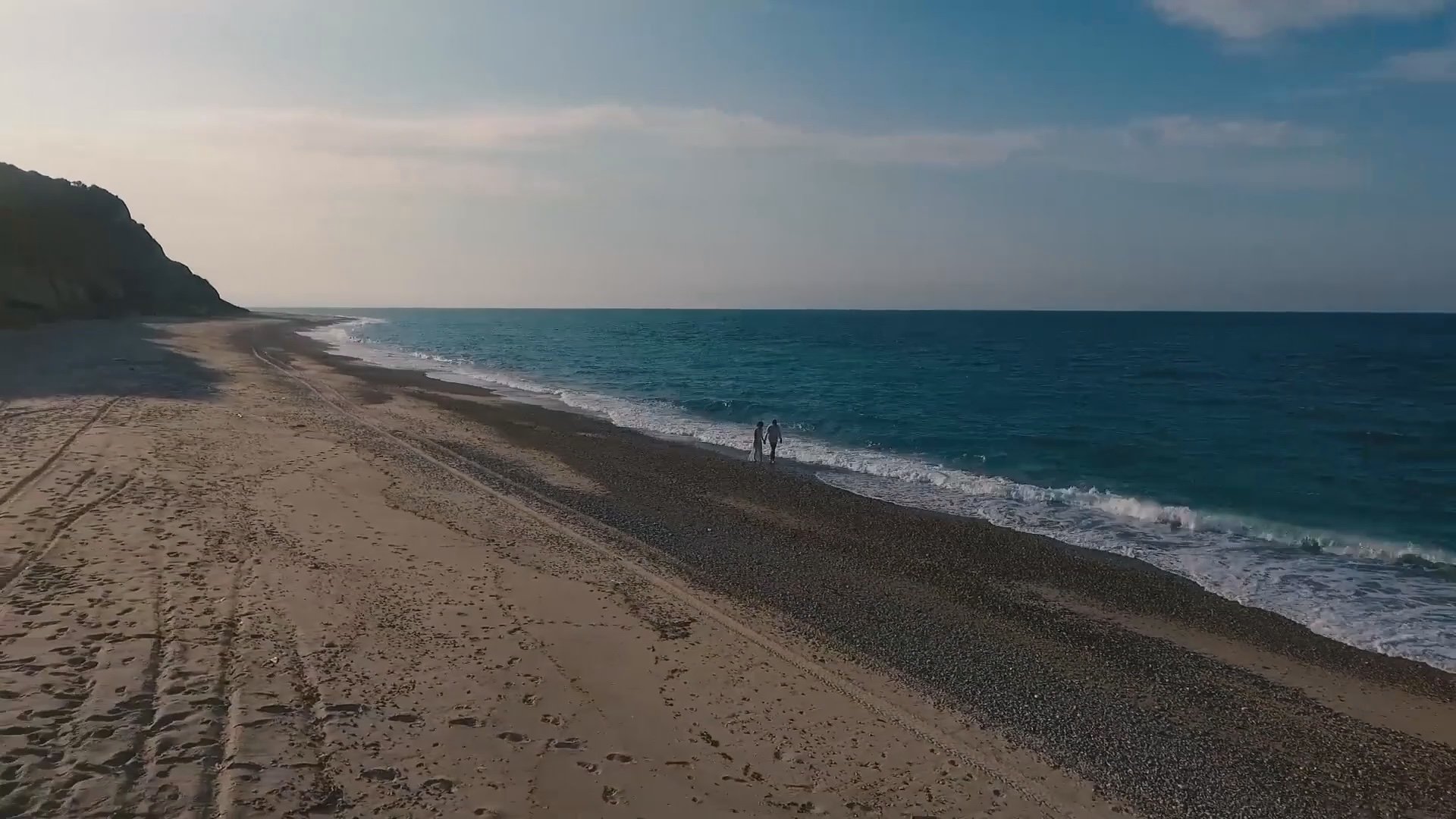 couple in love walking on a beach