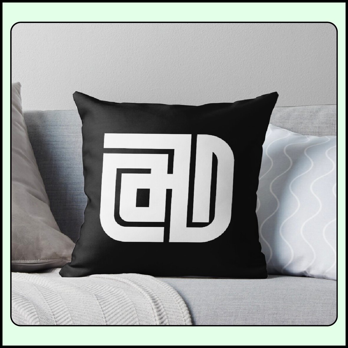 Arabic Kufi calligraphy “Helm” (Dream) with rounded corners on a decorative throw pillow