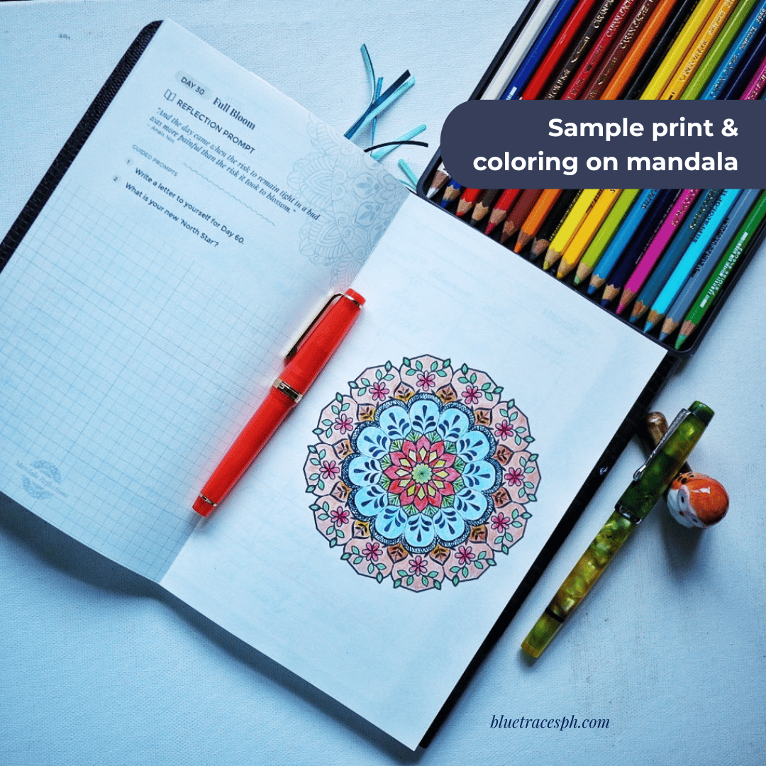 journal with a mandala colored illustration with colored pencils