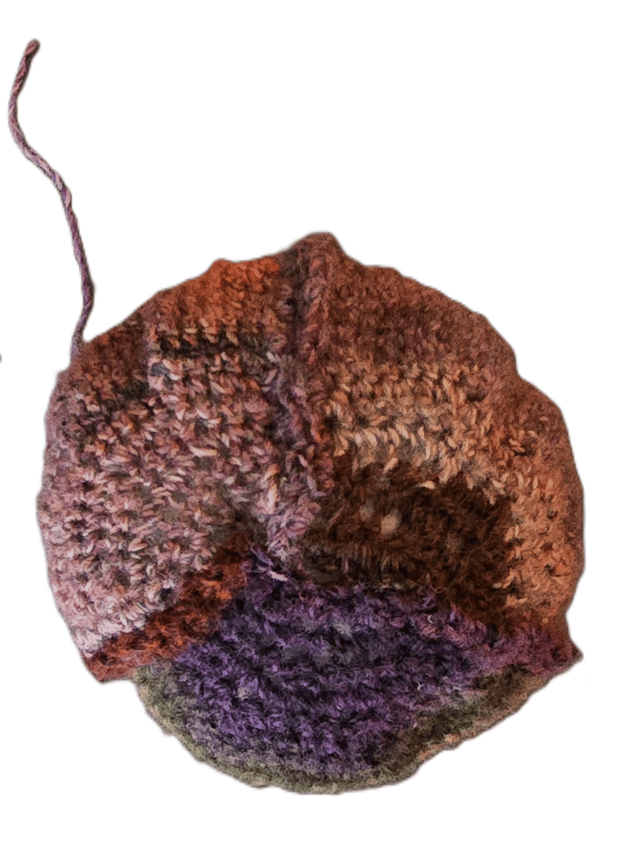 3 crochet cabbage leaves stitched together to make a cabbage head