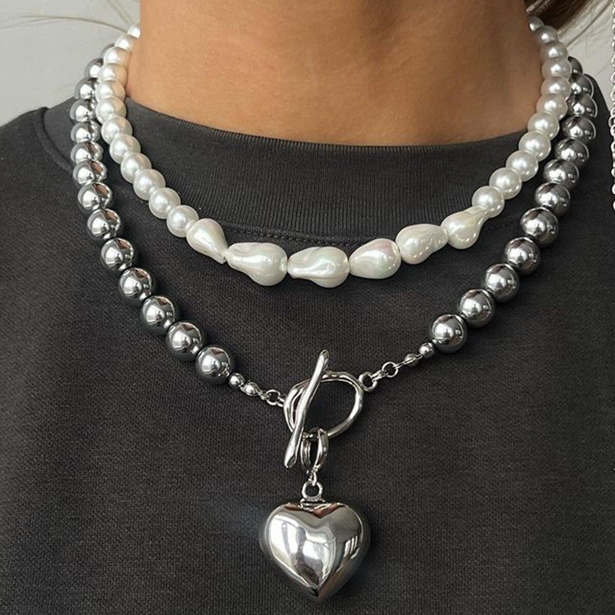 18K gold pearl necklace featuring unique irregular bead design