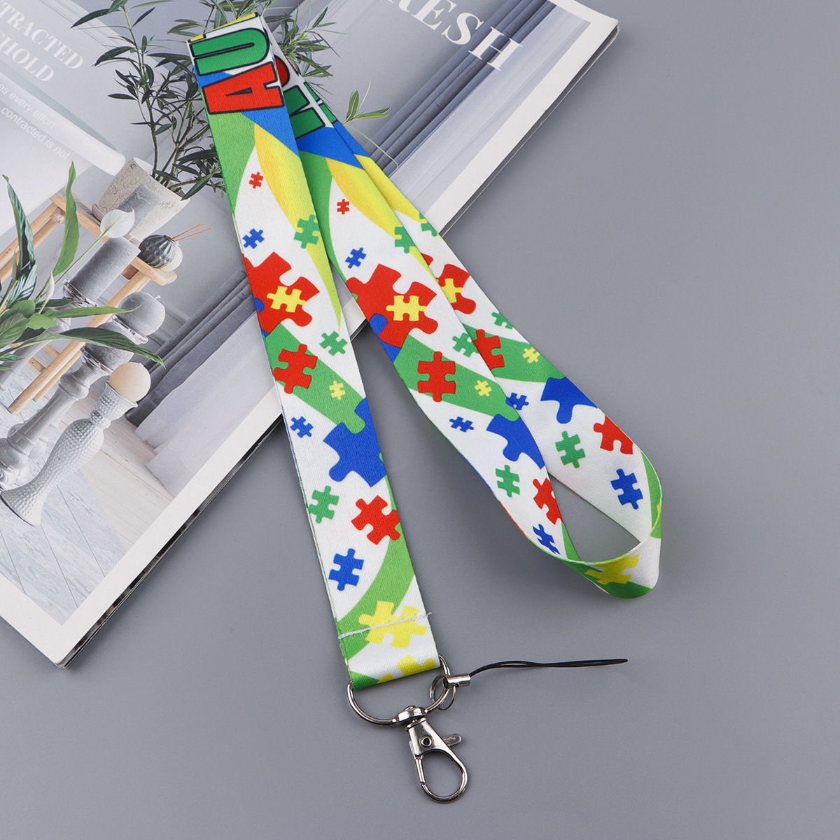 Puzzle ribbon style lanyard with clear card holder sleeve