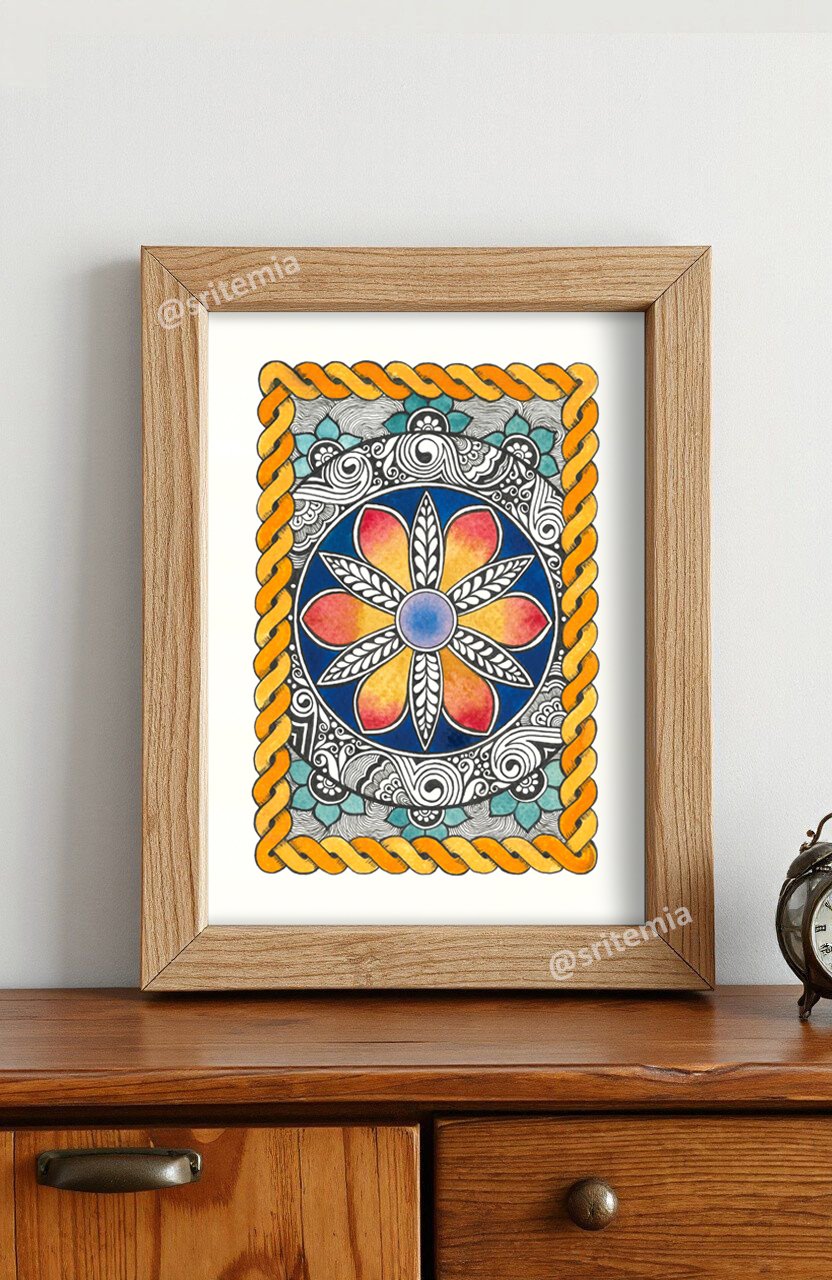 Mandala printable wall art framed and leaning on a table against a neutral wall, showcasing how the digital download looks in home decor for living rooms, bedrooms, or meditation spaces