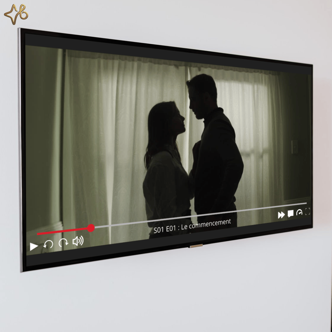 Gros plan sur un écran de télévision affichant une scène romantique de couple, tirée dune vidéo cadeau personnalisée avec barre de lecture de style streaming.