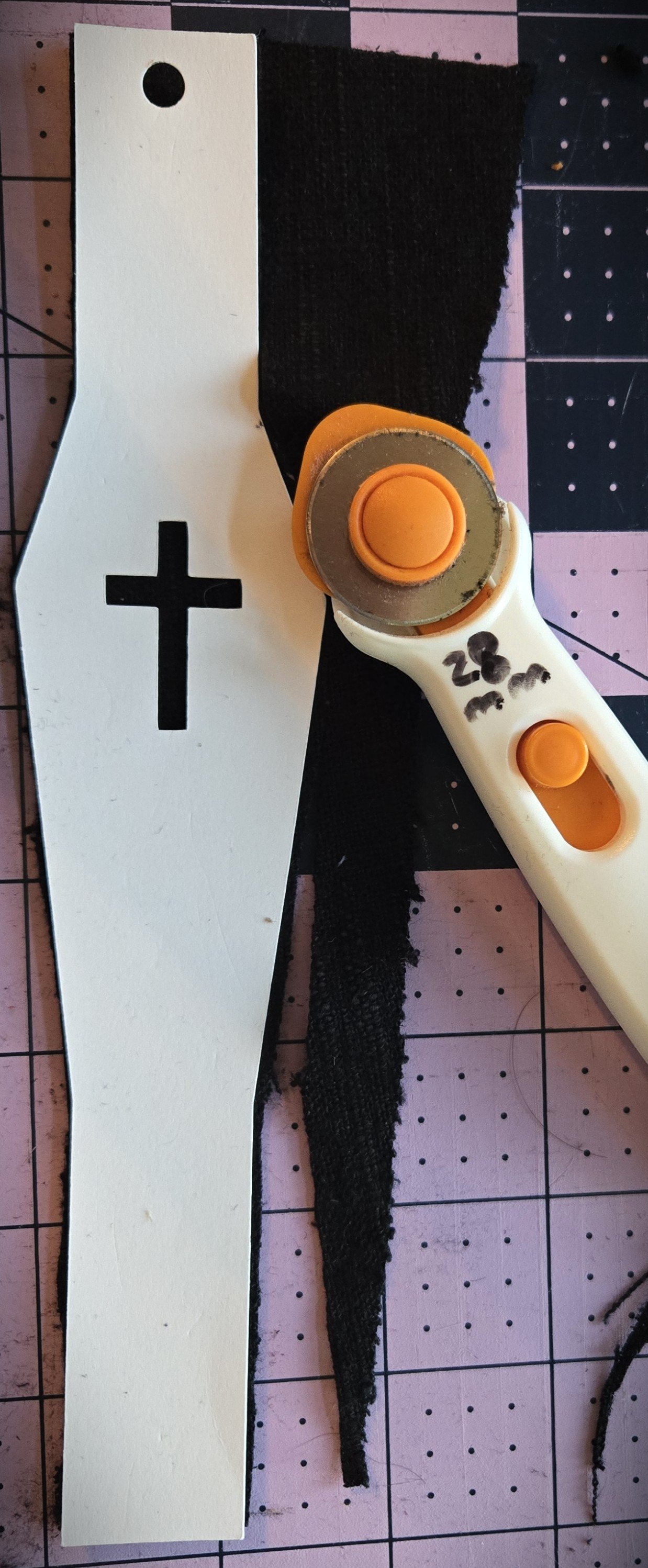 coffin anklet sewing pattern being cut out